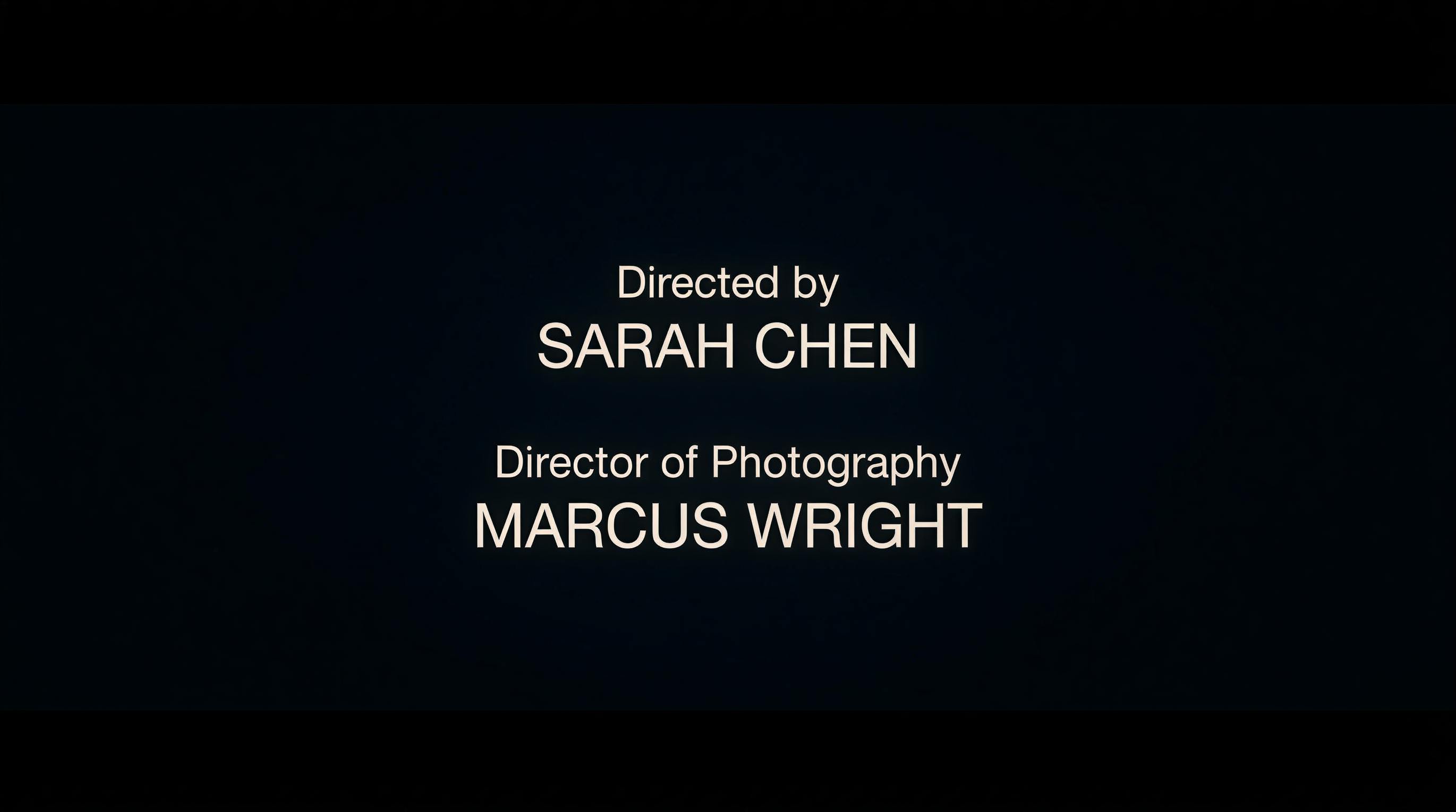 Film end credits frame showing director and cinematographer credits in clean sans-serif typography