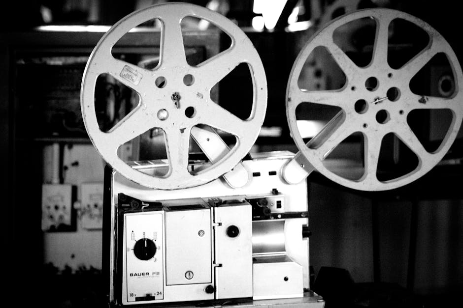 Black and white retro film projector with reels