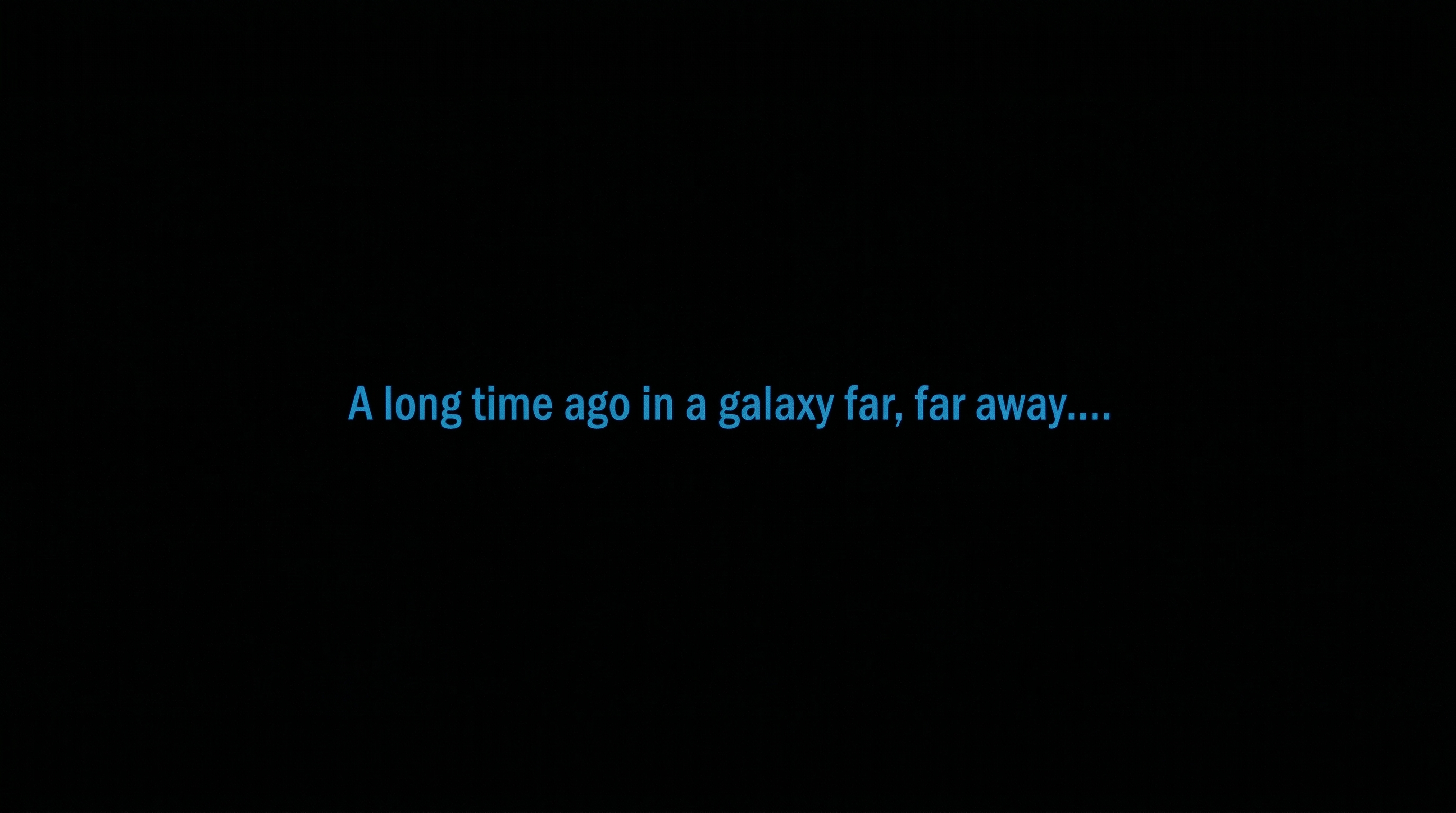 The iconic Star Wars opening card — blue text on black reading "A long time ago in a galaxy far, far away...."