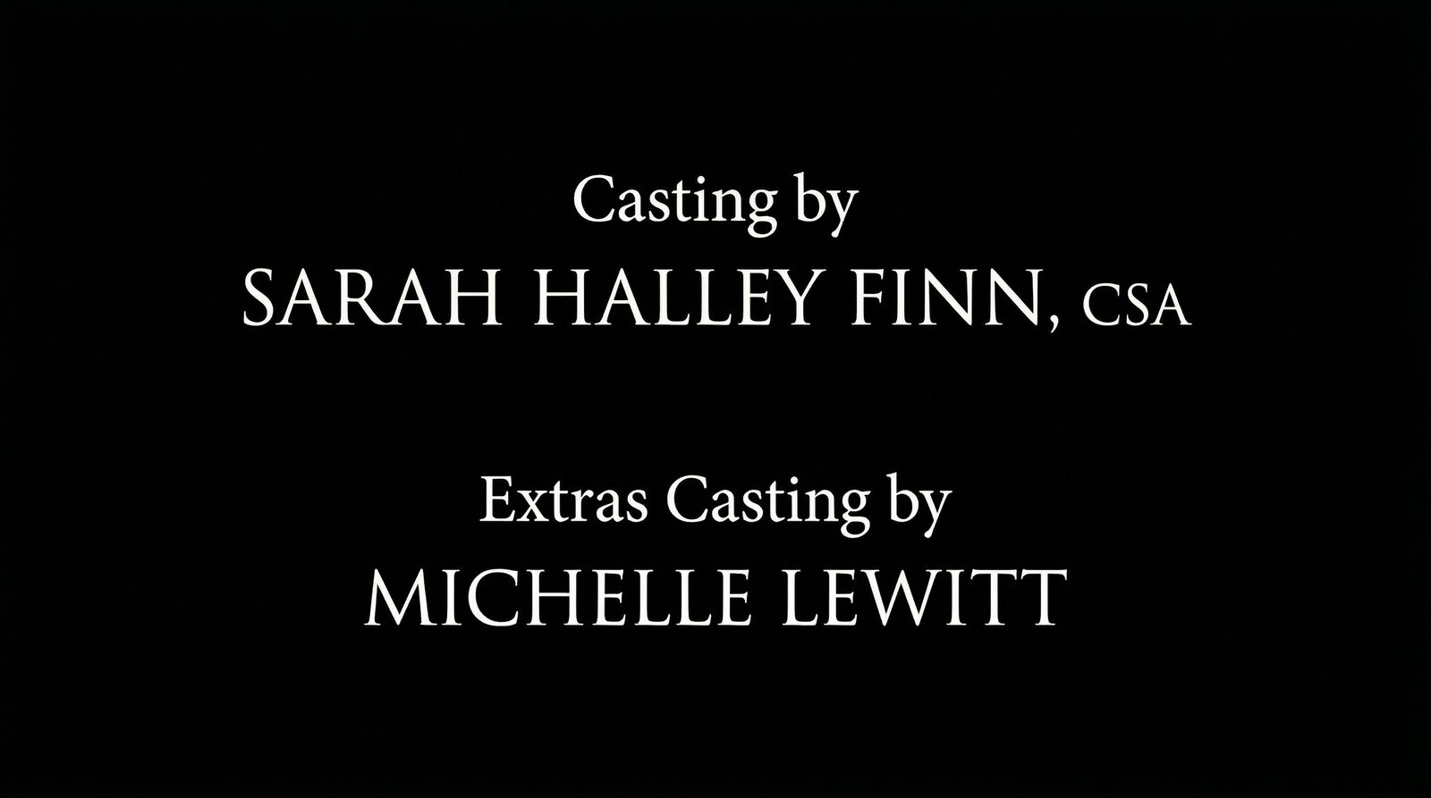 Film end credits scroll showing "Casting by SARAH HALLEY FINN, CSA" and "Extras Casting by MICHELLE LEWITT" in white serif text on black background