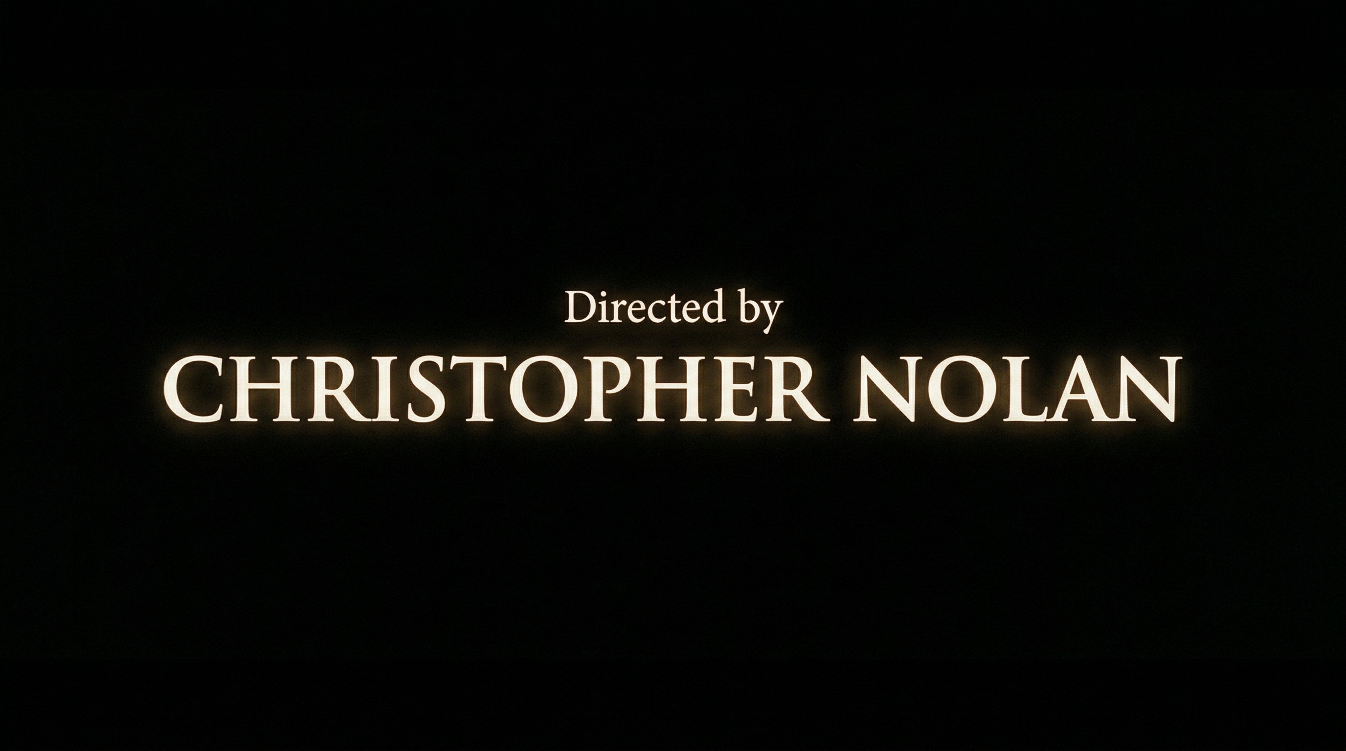 Example of a "Directed by" opening title card as it appears on screen in a Hollywood film, white serif text on black