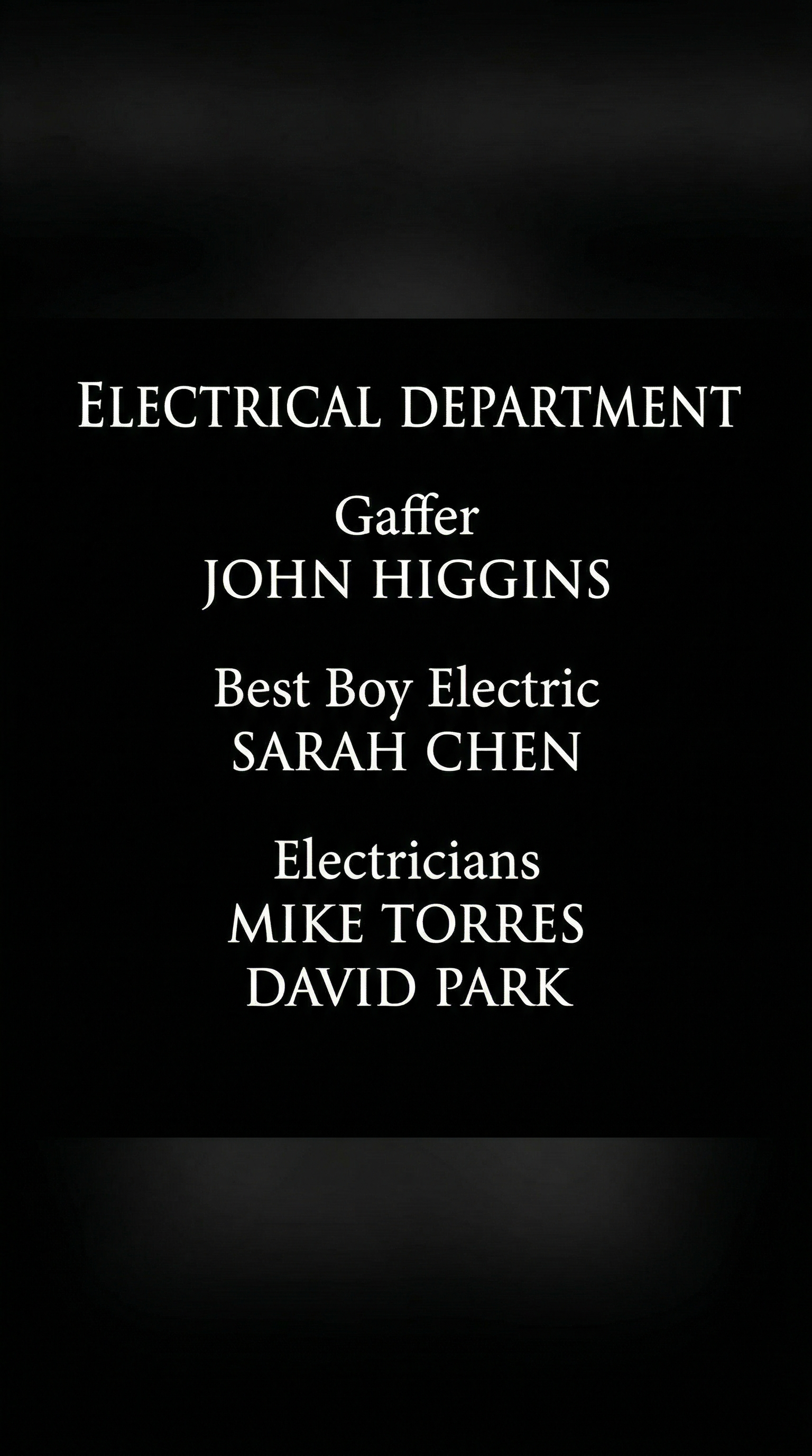 Film end credits scroll showing the Electrical Department block with Gaffer JOHN HIGGINS at the top, followed by Best Boy Electric and Electricians